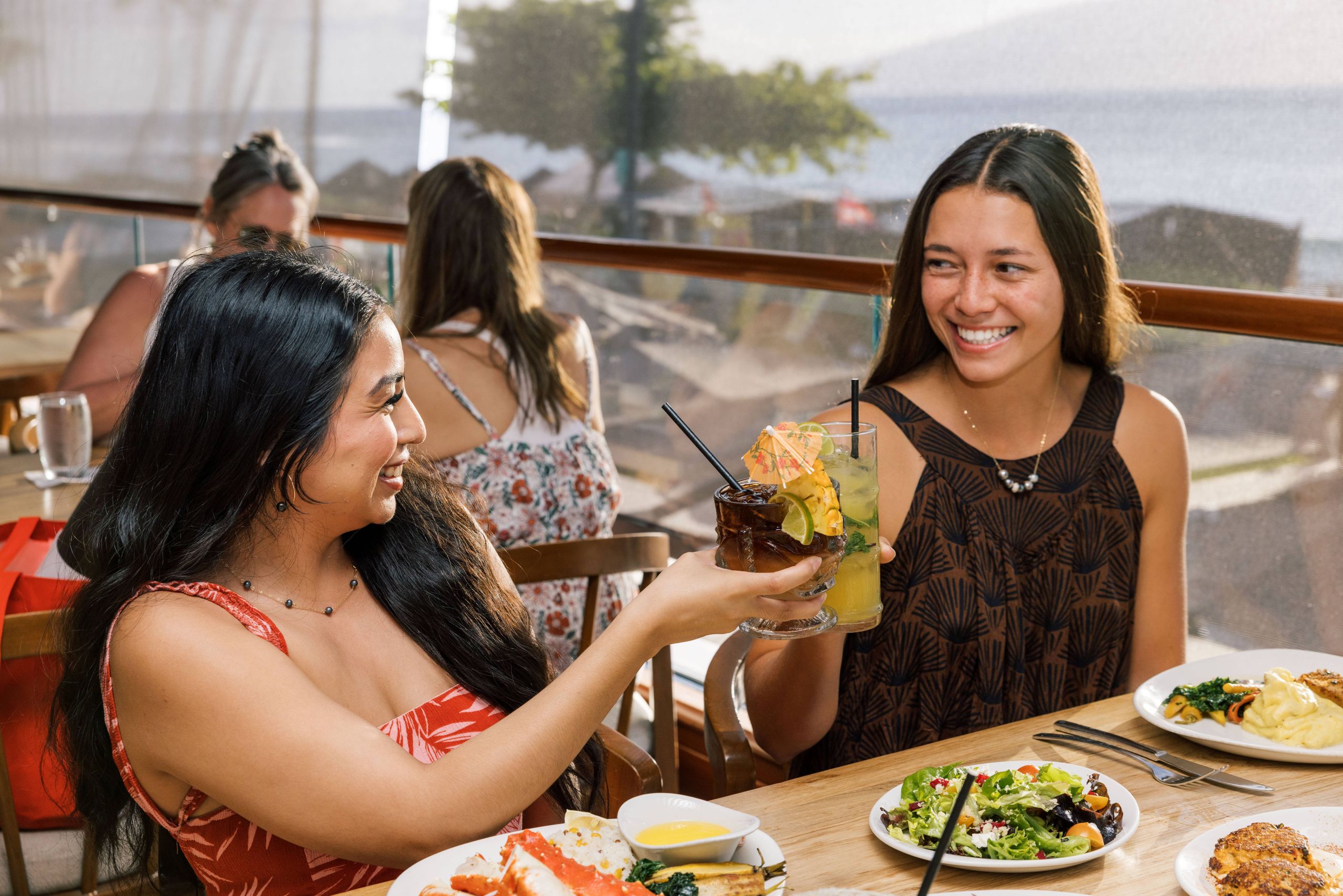 two women toasting