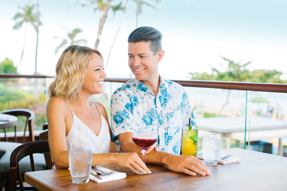 Couple enjoying drinks on the patio